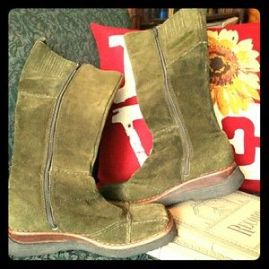 Frye brand knee high leather boots.